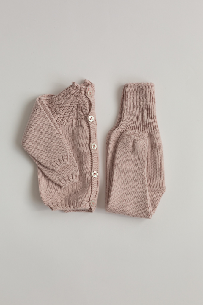 Jersey de trenzas con polainas rosa nude 