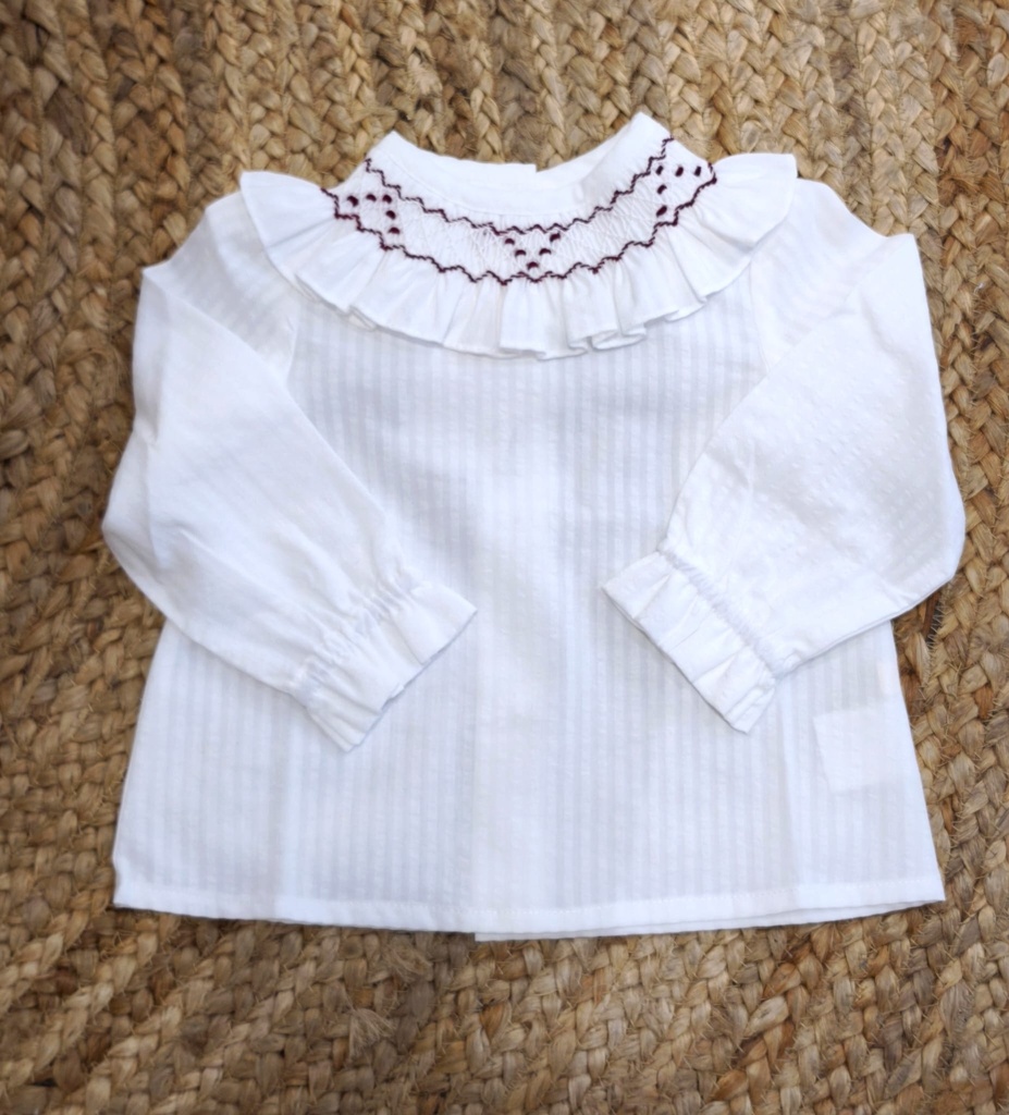 Blusa blanca cuello nido smock
