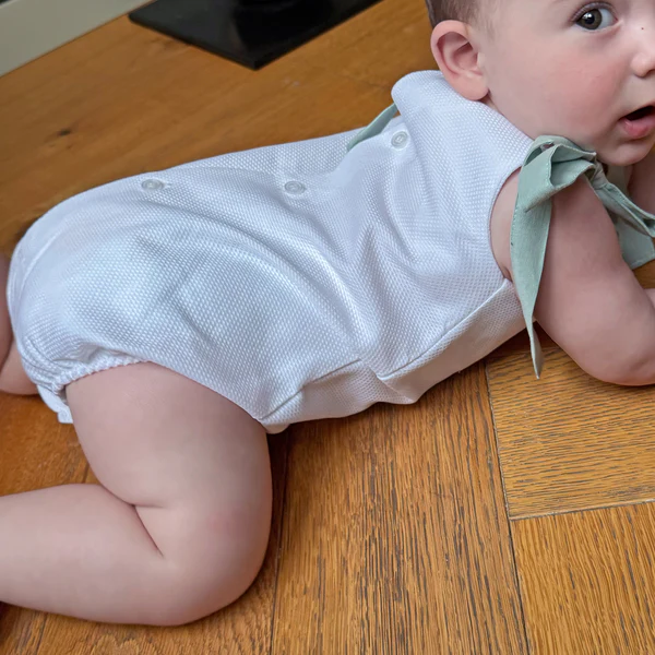 Pelele Mateo lazos rosa